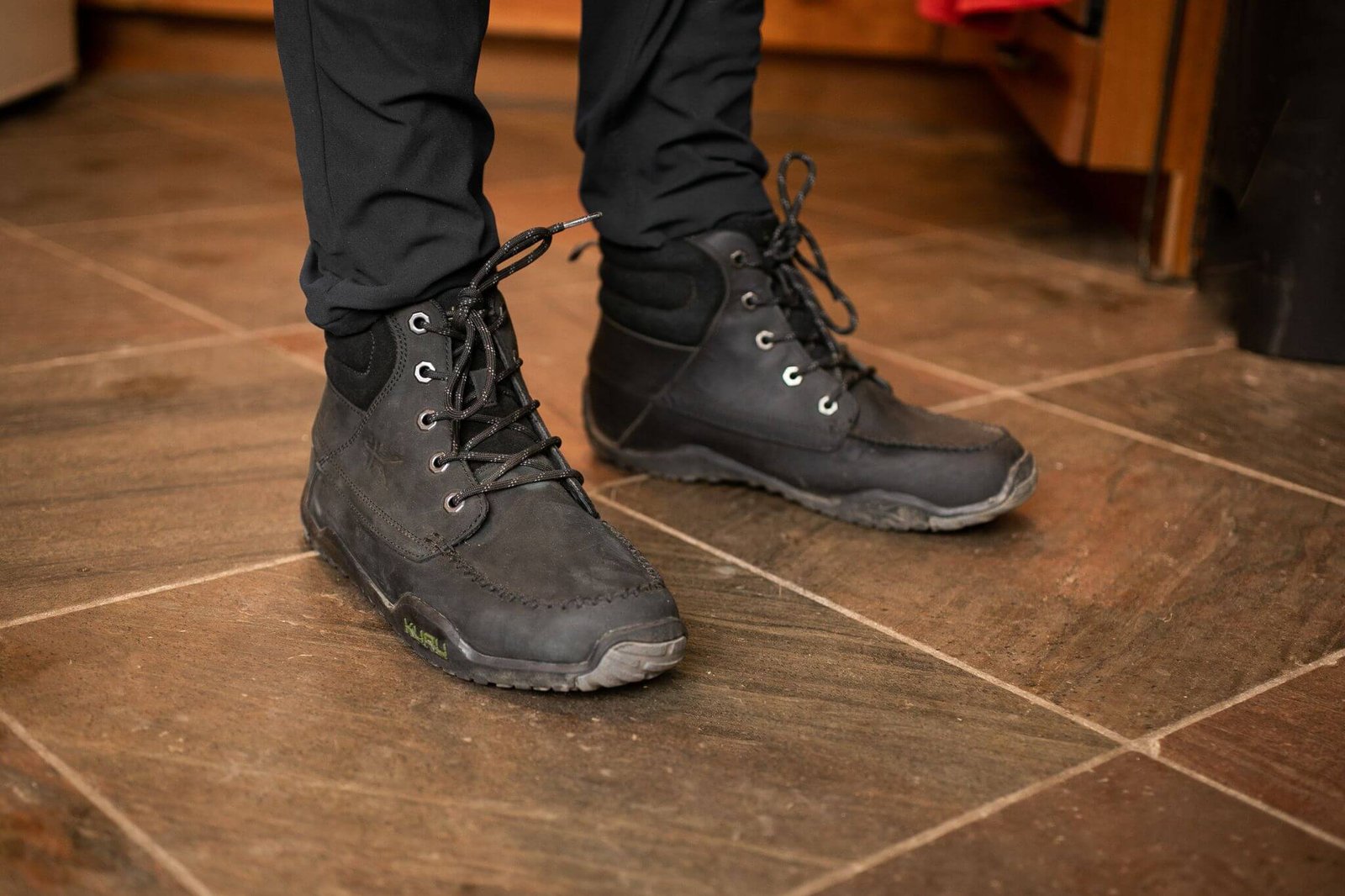 Man wearing KURU QUEST durable boots.